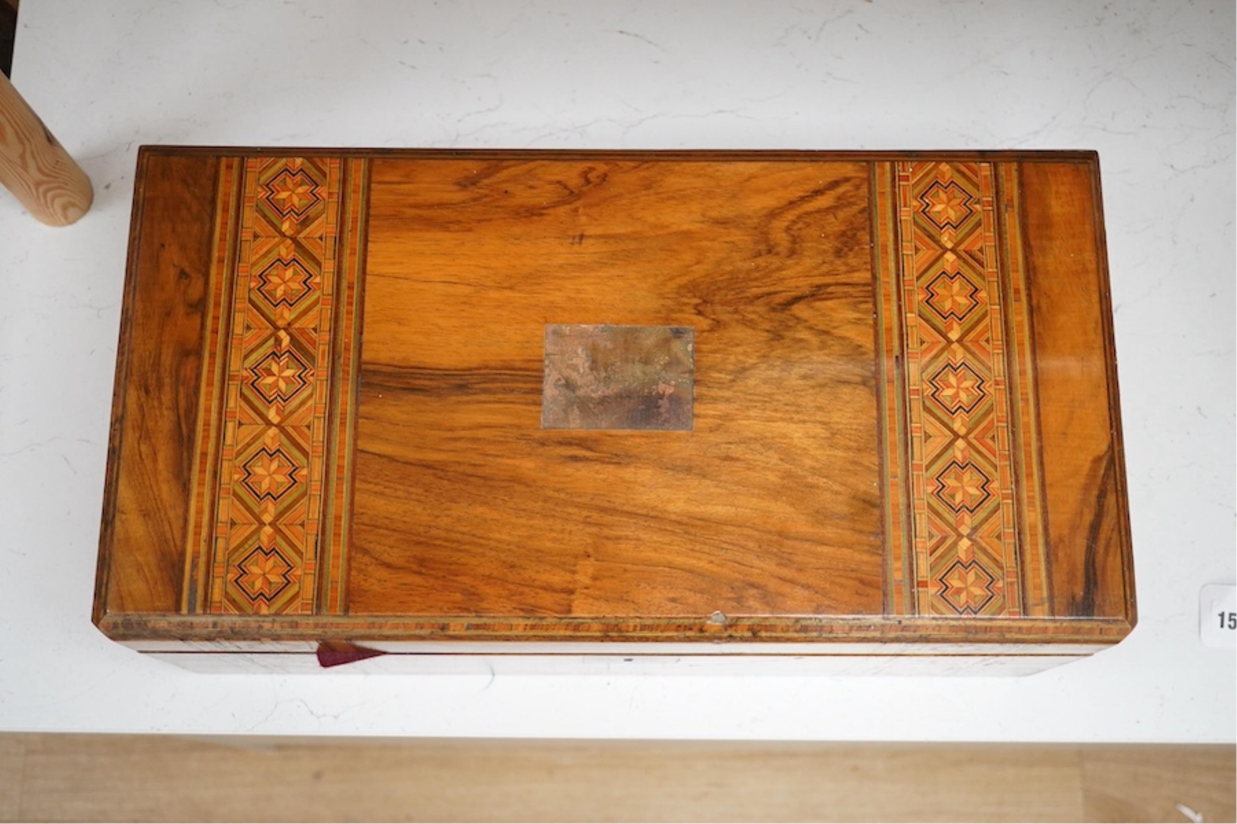 A Victorian inlaid walnut writing slope, 45cm wide x 26cm deep. Condition - brass plaque missing